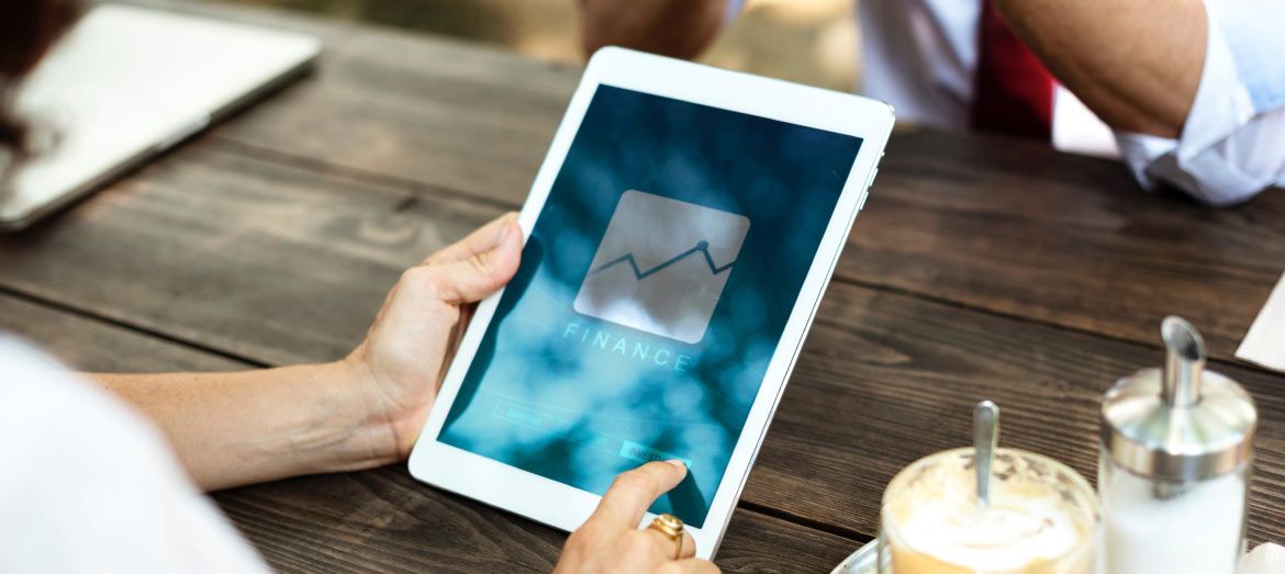 Person Working on Tablet